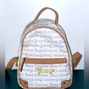 JUICY COUTURE backpack. New condition. Cream and white color. Removable pouch.